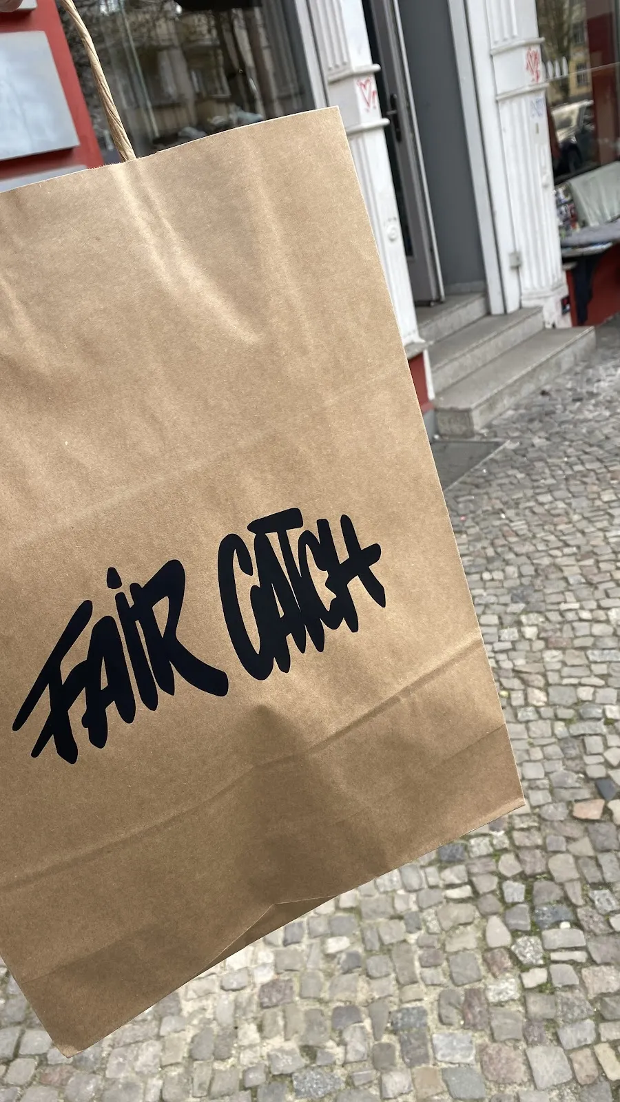 Вывеска Fair Catch GmbH в Берлине